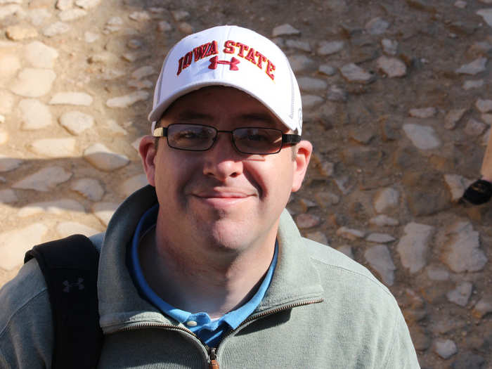 Iowa GOP Chair A.J. Spiker smiles for the camera.