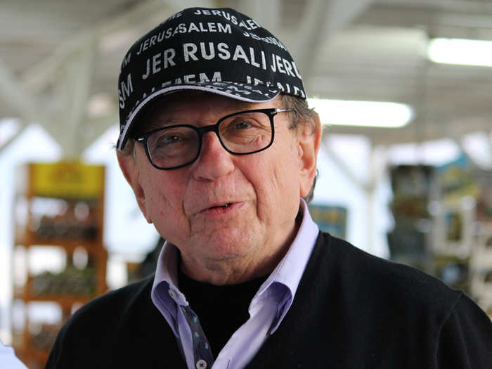 Washington Times political reporter Ralph Hallow gets in the spirit in a Dead Sea gift shop.