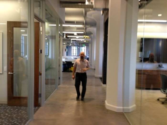 Don Otvos, senior manager of global sales operations, roams the new halls.