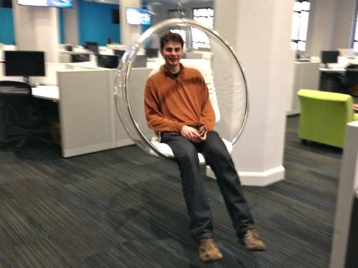 An engineer tests the swing seats.