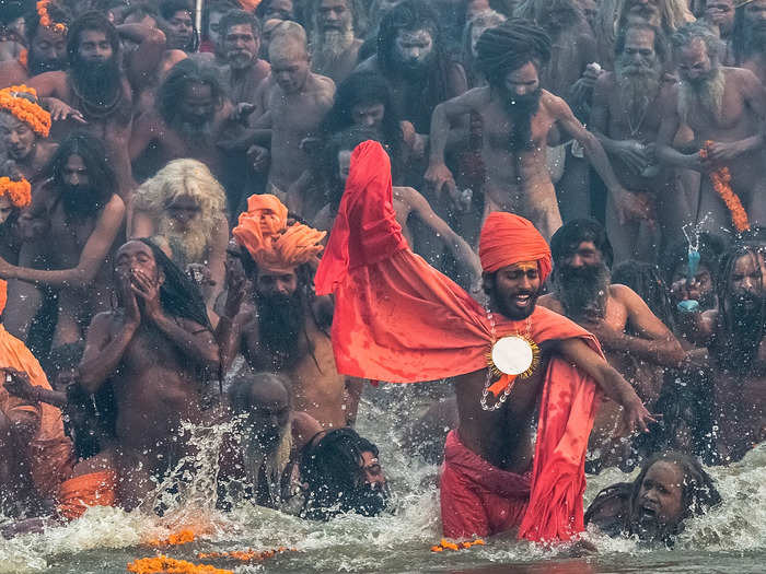 Hindus bathe in the confluence of three rivers to wash away their sins.