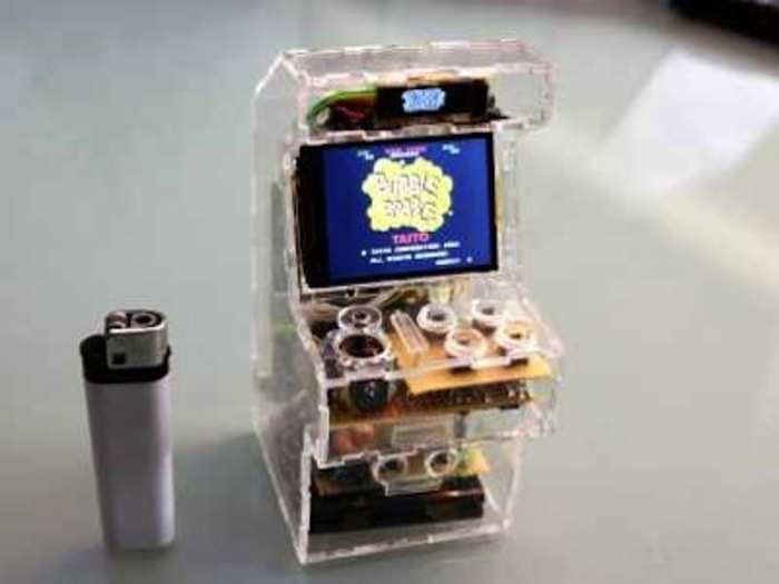 Hand-held arcade cabinet