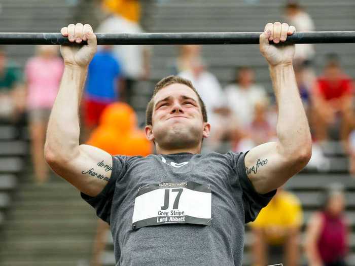 Greg Strippe, a regional consultant for investment management firm Lord Abbett & Co., doing pull ups.