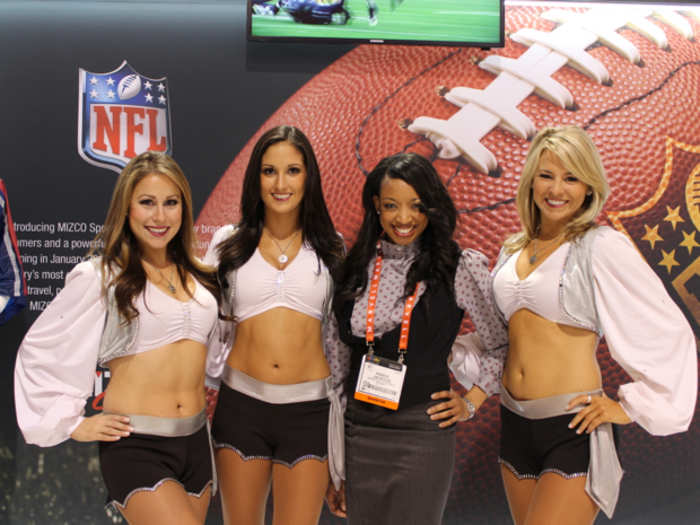 Perhaps our favorite booth babes, the Mizco booth featured actual Oakland Raiderettes who posed with a fan. Mizco is a supplier of mobile phone headsets and accessories.