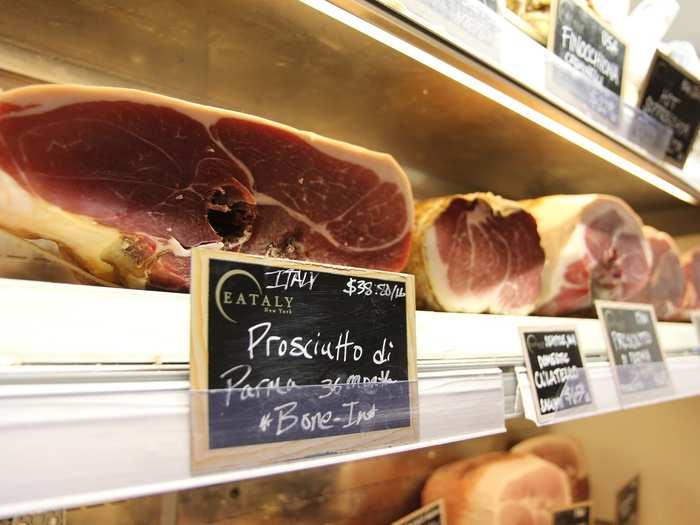 ... to aged, imported products, like this Prosciutto di Parma.