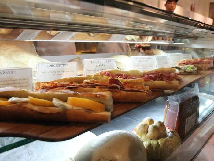 Here some of the meats and cheeses seen at the cheese counter are used to make classic Italian panini.