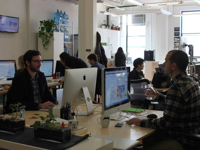 Co-founders Aaron Schildkrout, left, and Brian Schechter sit in the center of the office. They