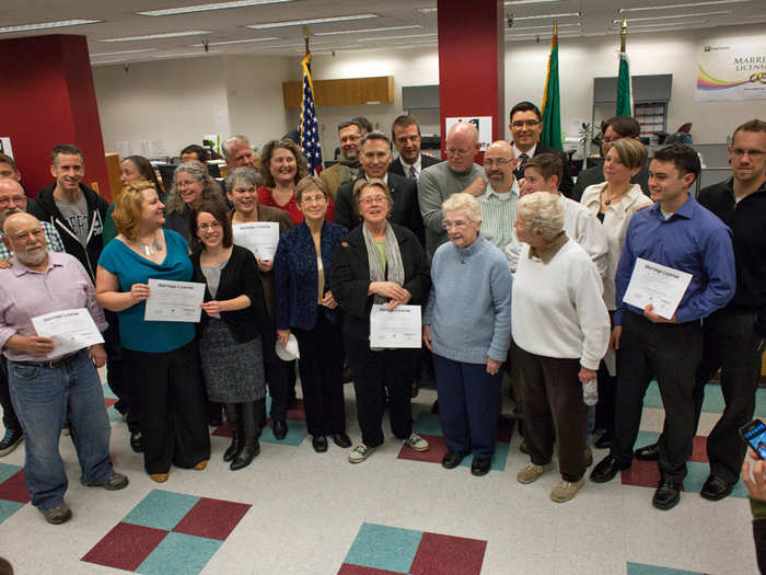 Same-sex couples in Seattle, Wash., turned out in droves at midnight on Dec. 6 to legally tie the knot.