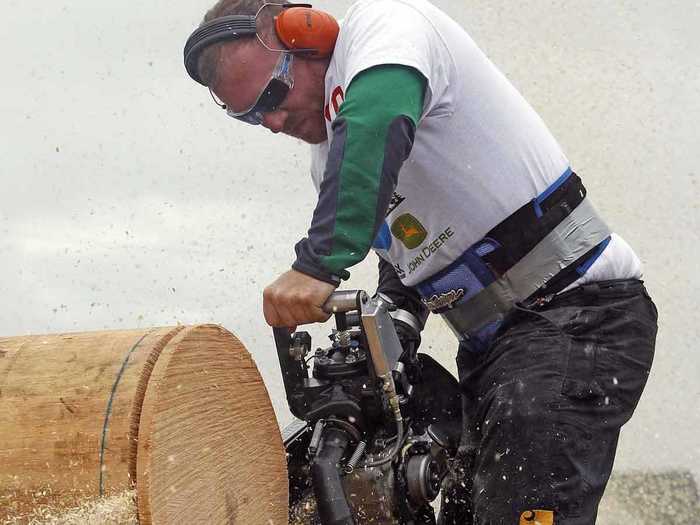 TJ Bexten from Aberdeen, Washington cuts through a 20-inch-diameter white pine log during the hot saw event.