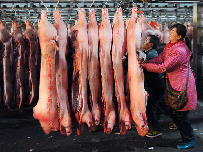 China produces nearly six times as much pork per person as the rest of the world.