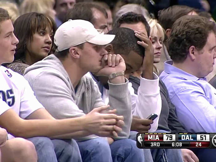 He sat courtside at a Heat-Mavericks game in Dallas, and the announcers openly wondered how he got the seats