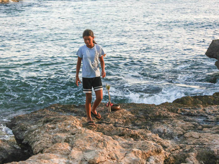 Maelia keeps a small offering here on the shore that she maintains and sets right before coming back to join our tour.