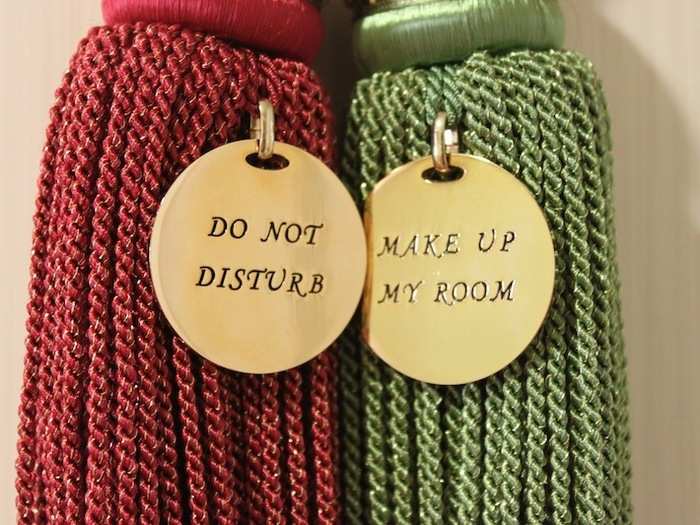 Forget those cardboard doorknob hangers – this hotel uses tassels.