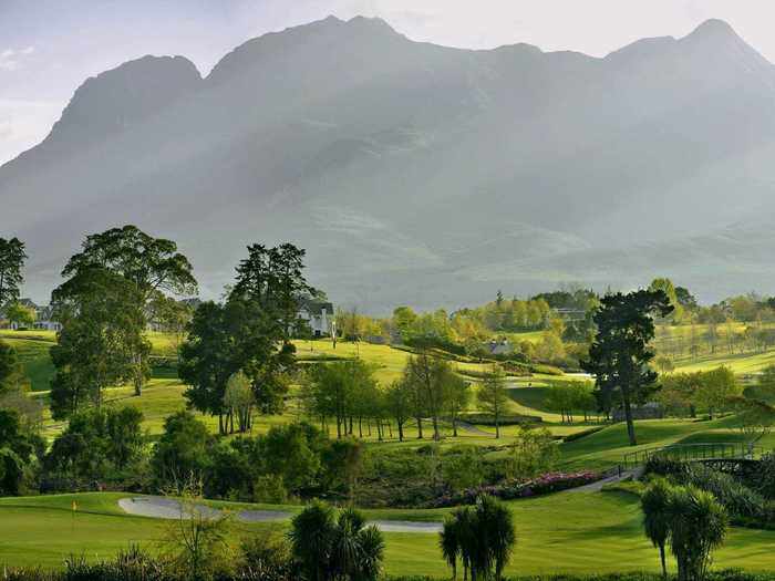 The Outeniqua Mountains serve as the backdrop for Fancourt (The Links) on the Western Cape of South Africa, which has been ranked the #1 course in South Africa.