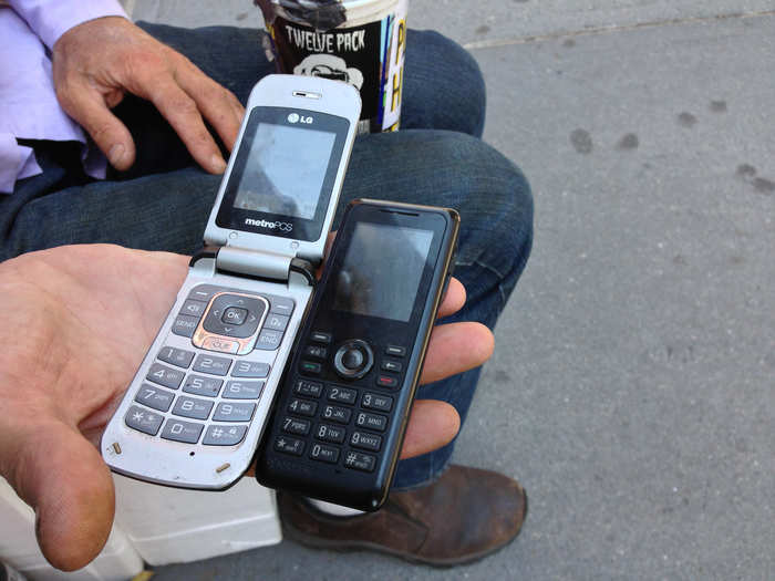 Charles owns two phones: a pre-paid LG flip phone, and a government-issued welfare phone, often called an "Obama Phone." Obama Phones come with 250 free minutes and 250 texts a month.