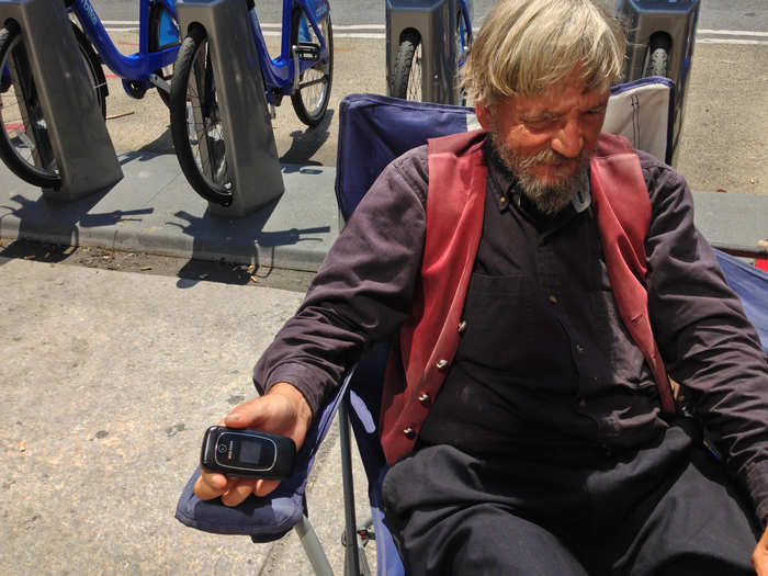 Malcolm has been in Manhattan for five years, after originally moving to the city from San Francisco to stay off the radar. "Lost my job," he said. "Bit of a disgrace, wanted to go somewhere anonymous." He now runs a small book store on the sidewalk, which he hopes to take online.