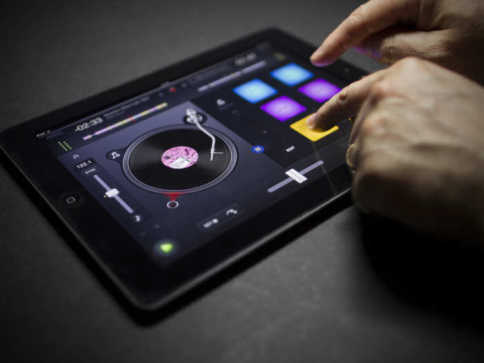 djay 2 is an iPad and iPhone app that transforms your tablet or phone into a full-fledged DJ system. The app gives your the same effects, looping, cue points, and auto-mixing capacities as the pros.