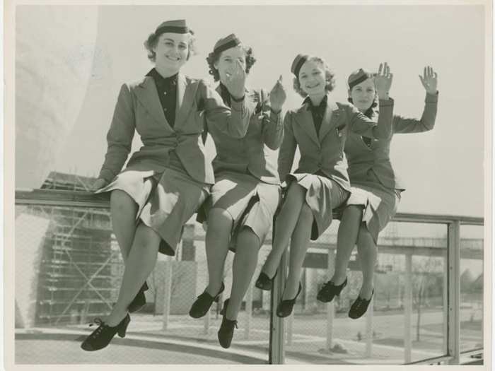 1939 - Airline "hostesses" wave at the camera in New York.