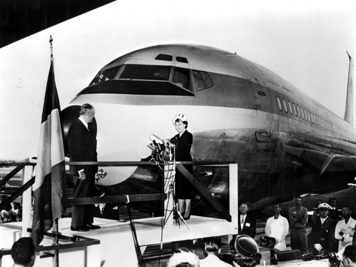 October 16, 1958 - First Lady Mamie Eisenhower and Pan Am Chairman Juan Trippe christen the Boeing 707-121, the plane that inaugurated the commercial jet age for the United States with its flight from New York to Paris.