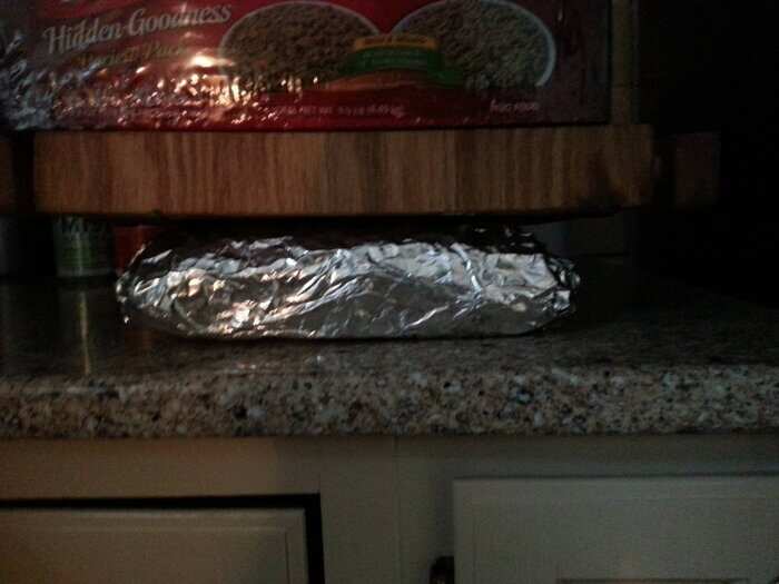 Wrap it up in tinfoil and smash it all down. Be merciless.