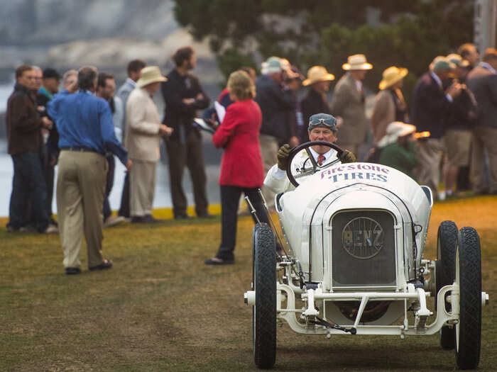 At dawn, the competing cars rolled onto the field.