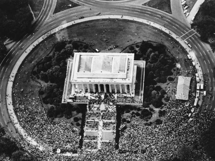 Then, the still-peaceful sign-carrying parade traveled to the Washington Monument.