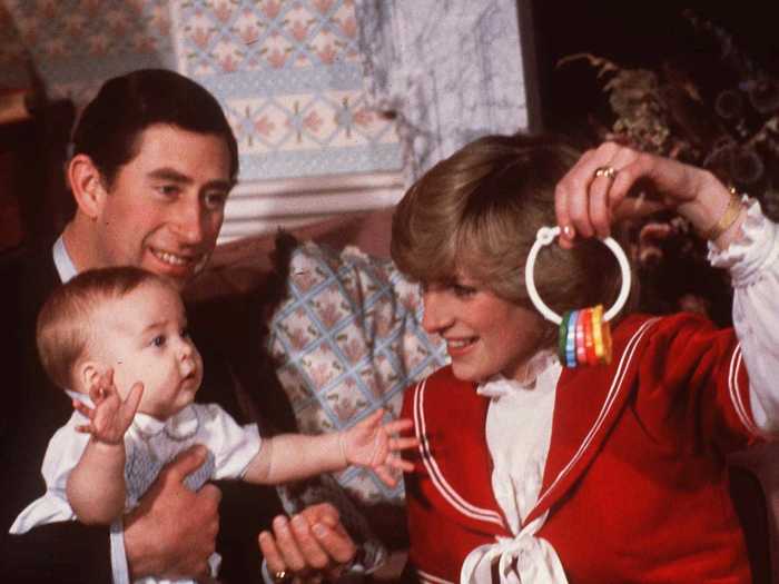 The young family, including Prince William, takes part in a photo shoot at Kensington Palace in 1982.