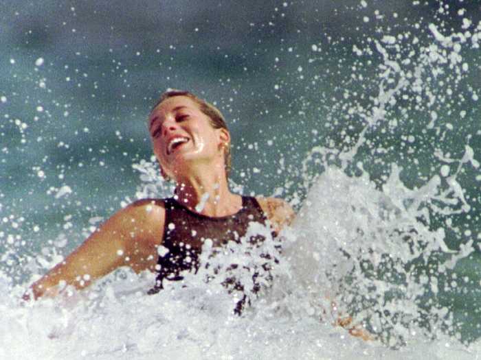 The princess takes the day off, frolicking in the surf during a vacation on St. Kitts island.