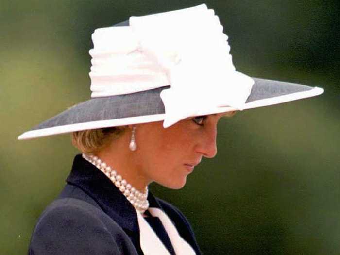 The Princess of Wales watches the Light Dragoons regiment on parade at their northern Germany base.