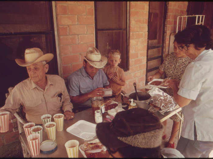Ranch Family in the Leakey, Texas, and San Antonio Area Eating on the Porch of the Bunkhouse 05/1973