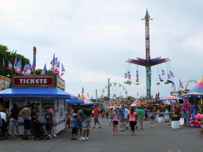 Down on Midway, fair-goers ride the rides and win some epic prizes. There are over 300 rides and attractions here alone.