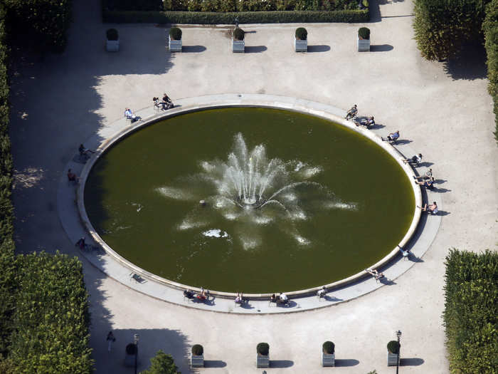 On nice days, Parisians relax around gardens and fountains, like this one in the Palais Royal Garden.
