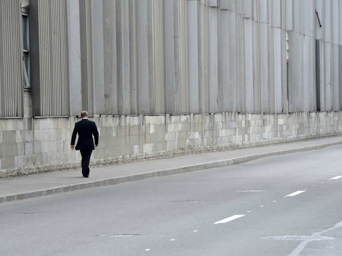 When his long time Judo coach died, Putin shooed away his security detail. Here, the man walks, and mourns, alone.