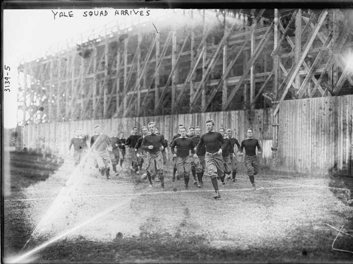 Yale running onto the field (ca. 1910-1915)