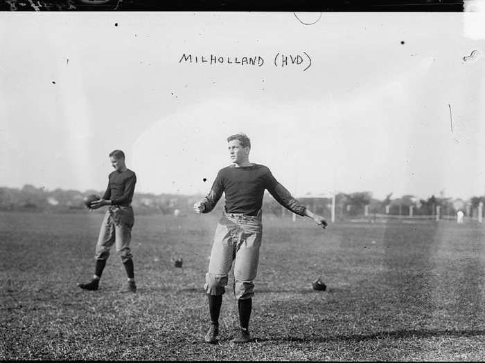 Two Harvard players practicing punting (ca. 1910-1915)