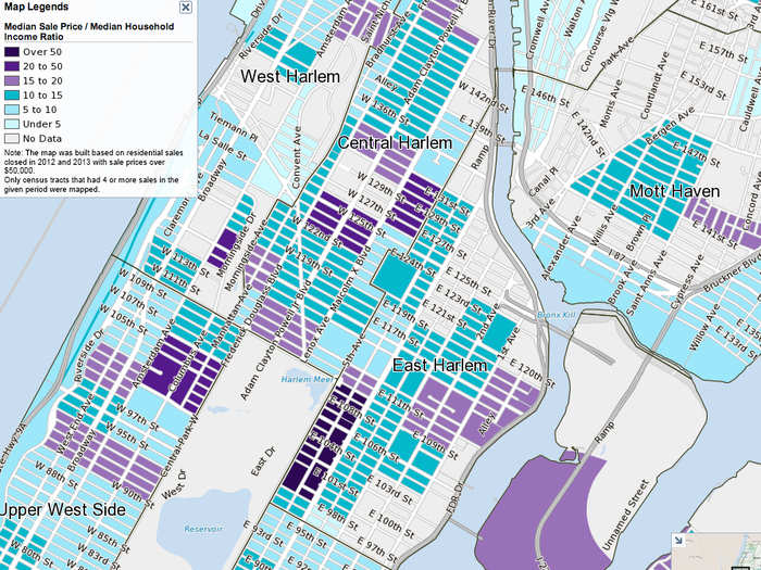 Spanish Harlem is changing. Dark purple real estate is selling at prices that are much higher than the median income of the block ... i.e., rich people are moving in.