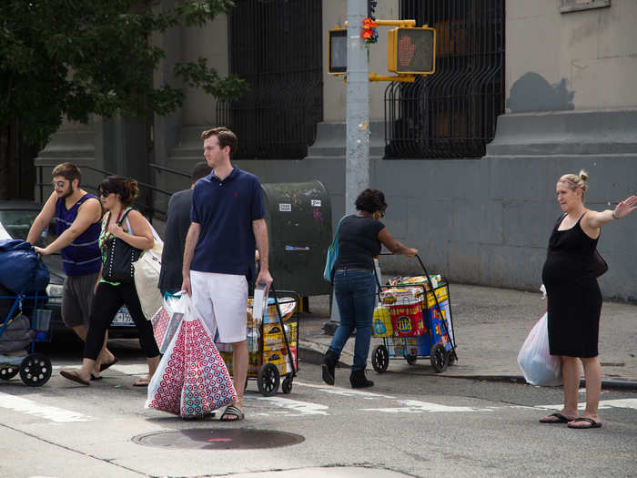 The Target store at East River Plaza has brought in lots of people — some just to shop, others to live. Combined with the Costco the two stores have hurt smaller shops, but also offer locals cheaper prices.