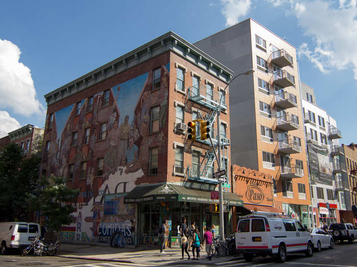 Beyond the super-luxury and massive complexes, this iconic and now almost ironic mural sits near one of the more modest newer developments.