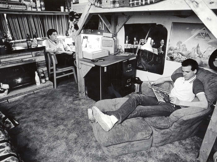 We like what the guys in this 1986 photo did with the place. And the fireplace is a rare luxury for a college dorm.