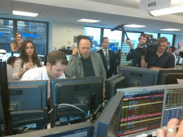 Actor Billy Crystal taking calls.