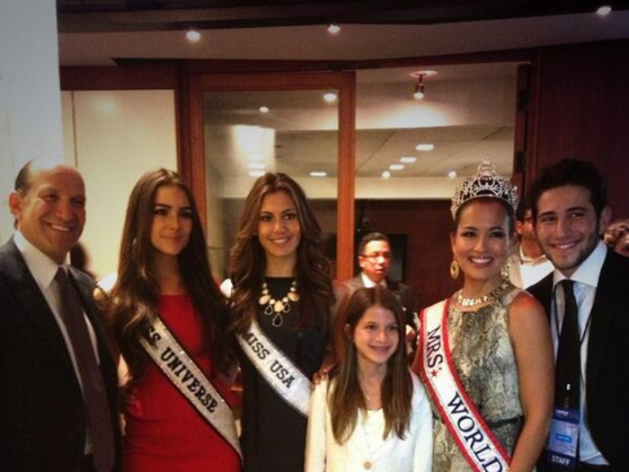 Howard Lutnick with Miss Universe Oliva Culpo, Miss USA Erin Brady and Miss World April Lufriu.