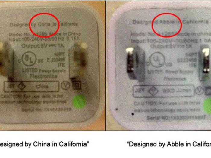 On fake Apple USB power adapters, the bottom might say "Designed in China in California" or have a typo that says "Abble." Also, "Designed" is incorrectly spelled "Designd."