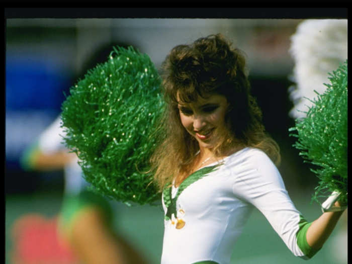 The Eagles cheerleaders wore leotards and had big pom poms in the late 