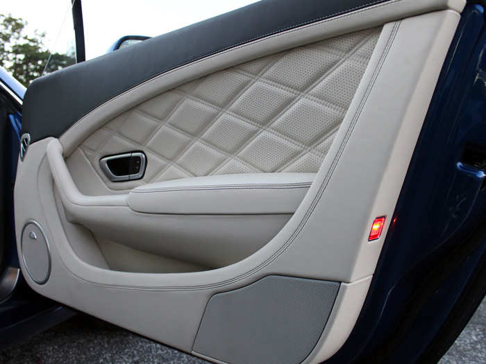 The hide on the seats and the door panels is quilted and perforated.