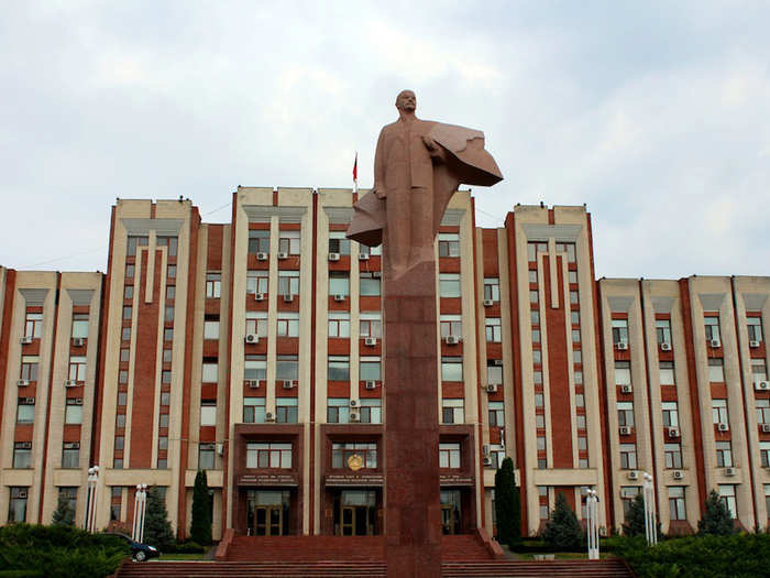 One of the main administrative buildings in Tiraspol, presided over by a statue of Lenin.