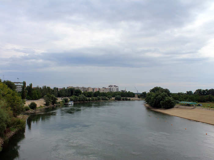 Tiraspol sits on the bank of the River Dniester. Beyond a pedestrian bridge are the city