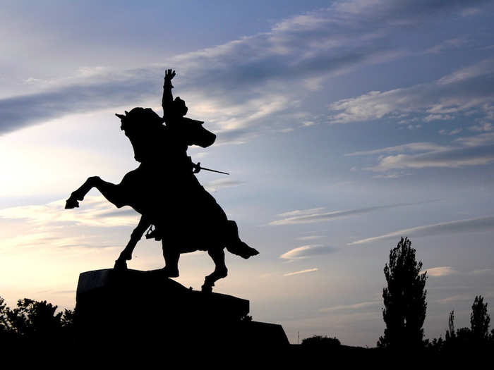 A local hero is celebrated with a vast statue of a soldier on horseback.