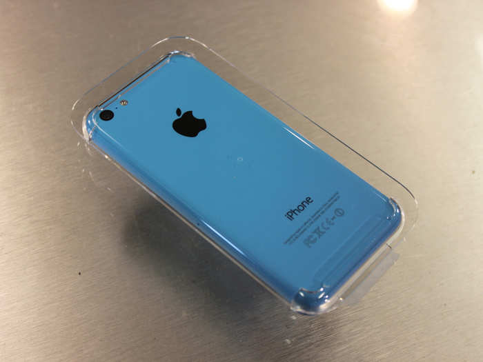 The iPhone 5C is held into place in this plastic thing.