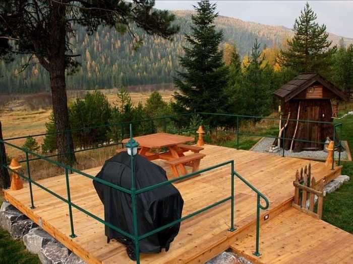 The deck has a picnic table and gas barbecue, and overlooks the scenic Shire.