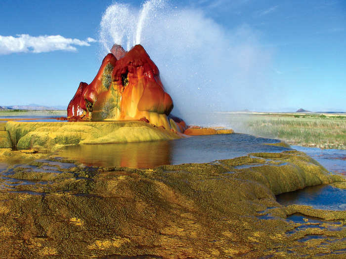Fly Geyser is a little-known tourist attraction in Nevada that was accidentally created in 1916 during a well drilling. Water heated by geothermal energy escaped to the surface, creating the multi-colored mount.